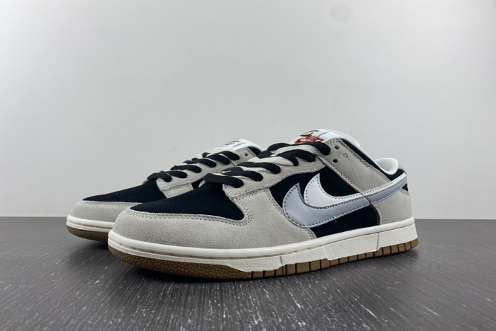 NIKE DUNK LOW “STENCIL SWOOSH” DO9457-100